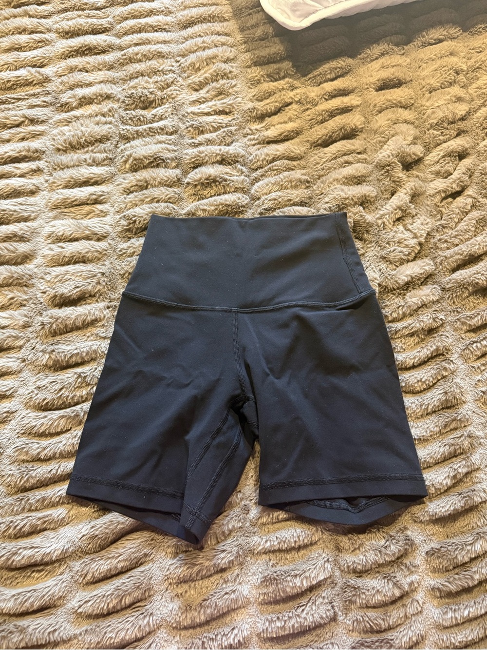 All black lululemon high-rise a line 6 inch biker short